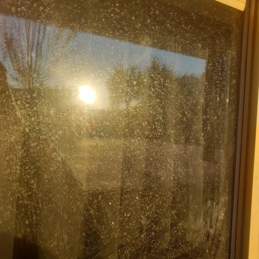 Window before washing, hard-water spots
